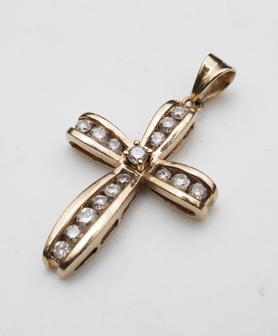 A diamond cross pendant